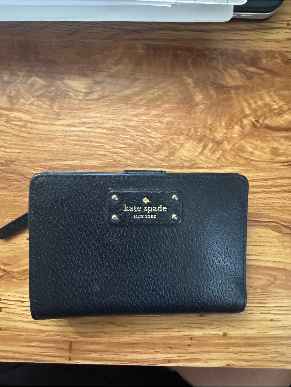kate spade Black Pebbled Leather wallet with Gold Plaque
